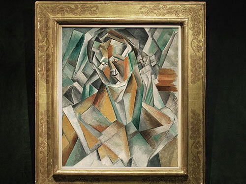 One of the most seminal works of Pablo Picasso has smashed an auction record by fetching a whopping USD 63.4 million at a Sotheby's auction here, almost USD 20 million more than the original estimate. Courtesy: CNN