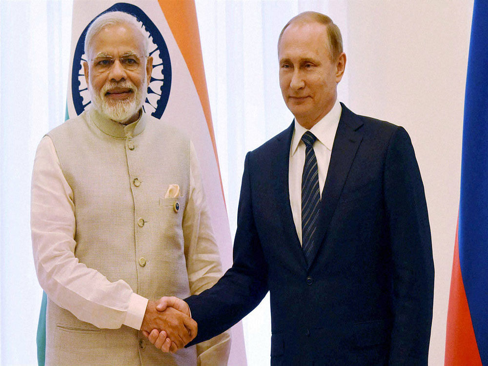 Prime Minister Narendra Modi and  Russian President Vladimir Putin. PTI file photo