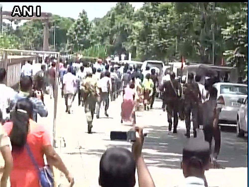 Police detained the nearly 100 protesters and took them to nearby police station. The farmers, who were protesting under the aegis of RTI activist Akhil Gogoi led Krishak Mukti Sangram Samiti (KMSS), were demanding exclusion of the 12 blocks in Assam and withdrawal of FDI in oil sector. Image courtesy: ANI Twitter