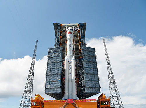 The 53-meter, 597-tonne, vertical-standing the Long March-7 rocket was launched from Wenchang launch centre, state-run Xinhua news agency reported. Reuters file photo