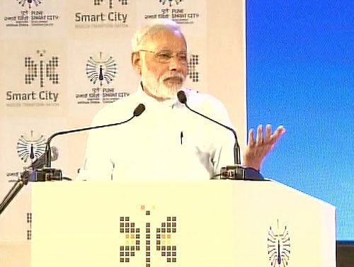 As the Prime Minister launched 14 smart city projects in Pune, and initiated 69 other works in other smart cities in the country, he made a plea for working in a comprehensive, inter-connected and vision-oriented manner and not in piece-meal. Photo courtesy: Twitter/ANI