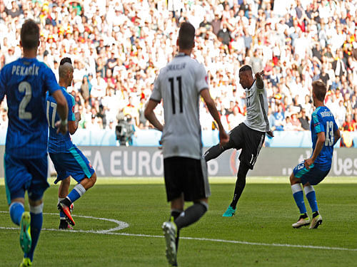 Germany's Jerome Boateng scores their first goal. Reuters photo.