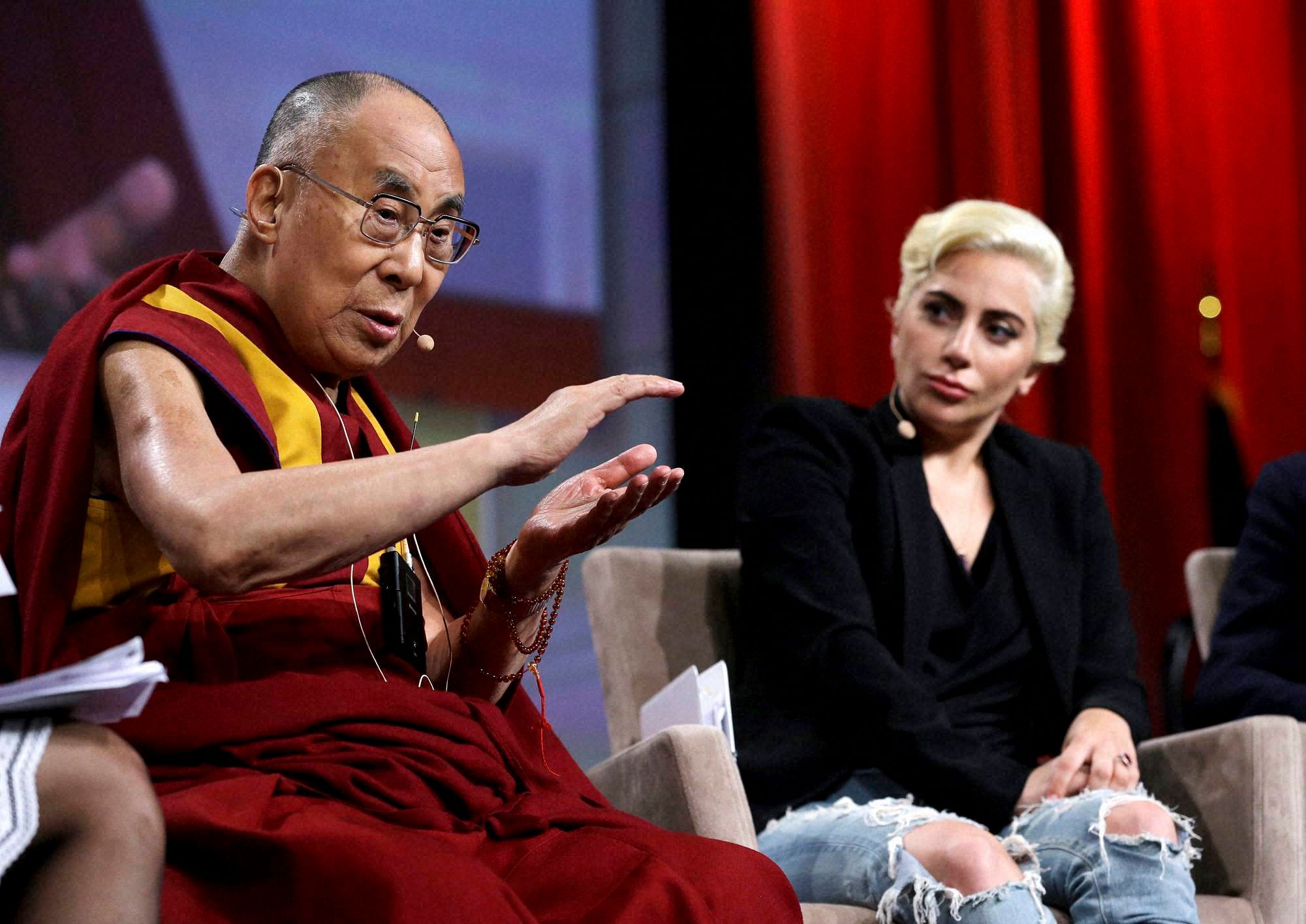 Pop sensation Lady Gaga with Dalai Lama. AP / PTI