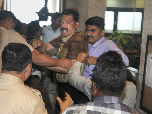Police arrest Shivsena activists who were staging a protest against Mumbai Karachi Friendship Forum in Mumbai on Tuesday. PTI Photo