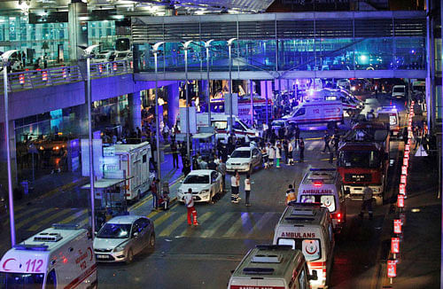 Security and rescue personnel gather outside Istanbul's Ataturk airport, early Wednesday, June 28, 2016. Two explosions have rocked Istanbul's Ataturk airport Tuesday, killing several people and wounding scores of others, AP/PTI
