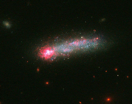The dwarf galaxy is shaped like a flattened pancake, but because it is tilted edge-on, it resembles a skyrocket. image courtesy: twitter