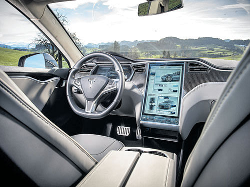 tragic loss: The interior of a Tesla Model S. Joshua Brown (inset) was killed in a crash in the US when his car, Tesla Model S electric sedan, was in self-driving mode. The death is a blow to Tesla at a time when the company is pushing to expand its product line-up. nyt/facebook