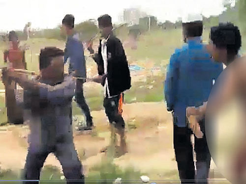 The footage also showed the suspects thrashing the children despite pleading with their tormentors for mercy as they were fasting for Ramzan. Screen grab.