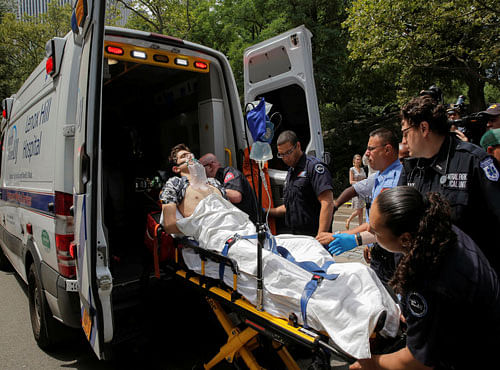 Man is loaded into ambulance after explosion in Central Park, in Manhattan, New York. Reuters photo