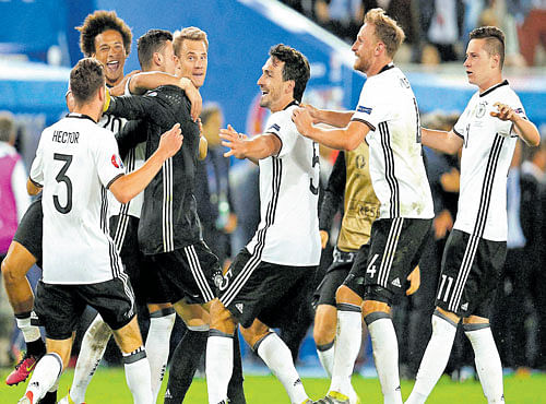 World champs Germany can't hide theire motions after marching into the semifinals. AP-PTI