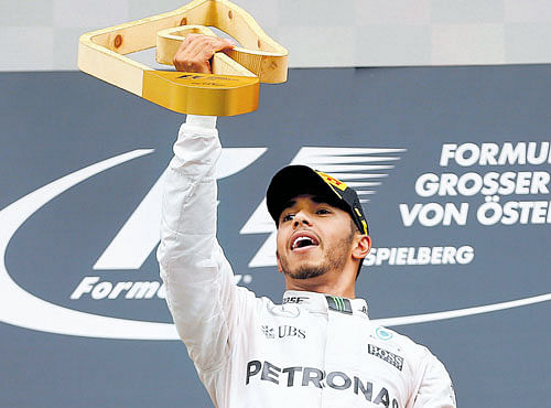 NAILED IT: Britain's Lewis Hamilton celebrates after winning the Austrian GP. REUTERS