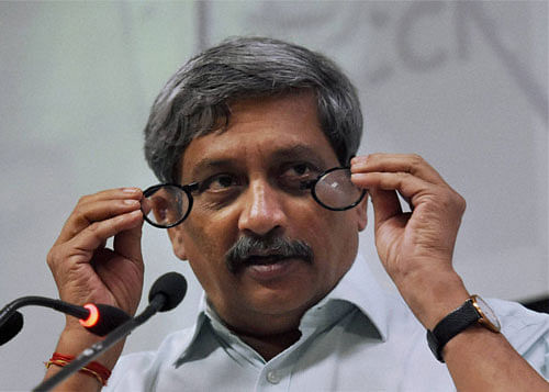 Defence Minister Manohar Parrikar addresses a FLO interactive session on 'Parivartan in Defence Sector: Changing Role & Opportunities for Women' at FICCI in New Delhi on Monday. PTI Photo