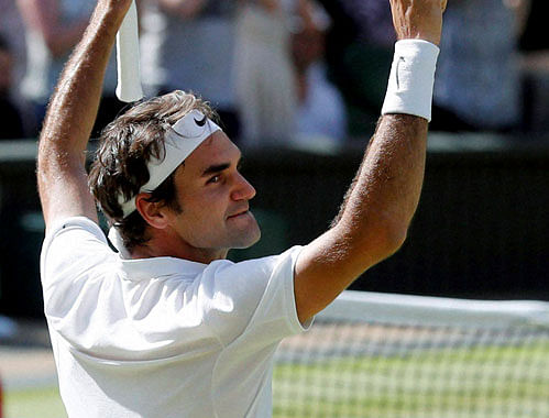 Roger Federer of Switzerland celebrates at match point after beating Marin Cilic of Croatia in their men's singles match on day ten of the Wimbledon Tennis Championships in London, Wednesday, July 6, 2016.AP/ PTI