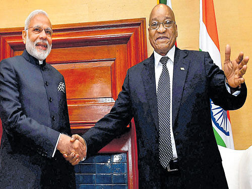 deepening ties: Prime Minister Narendra Modi with the President of the Republic of South Africa, Jacob Zuma in a  meeting at the Union Buildings in Pretoria, South Africa on Friday. PTI