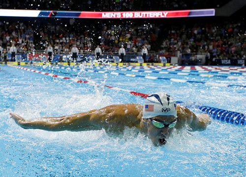 High five!: At Rio, Michael Phelps will be participating in his fifth Olympics. Reuters
