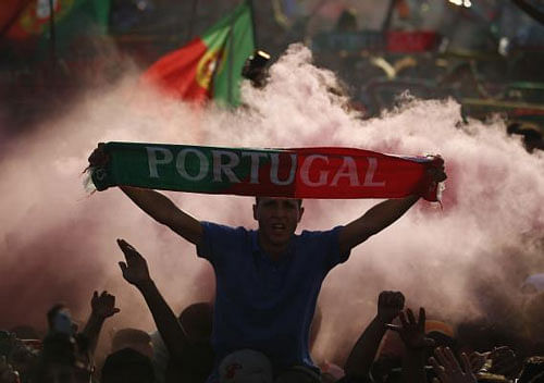 Fans of Portugal react as they watch the Euro 2016 final between Portugal and France at a public screening in Lisbon, Portugal, July 10, 2016. Reuters photo