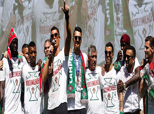 Cristiano Ronaldo and Portugal's winning Euro 2016 team celebrate at a reception for their fans in Lisbon, Portugal, July 11, 2016. REUTERS