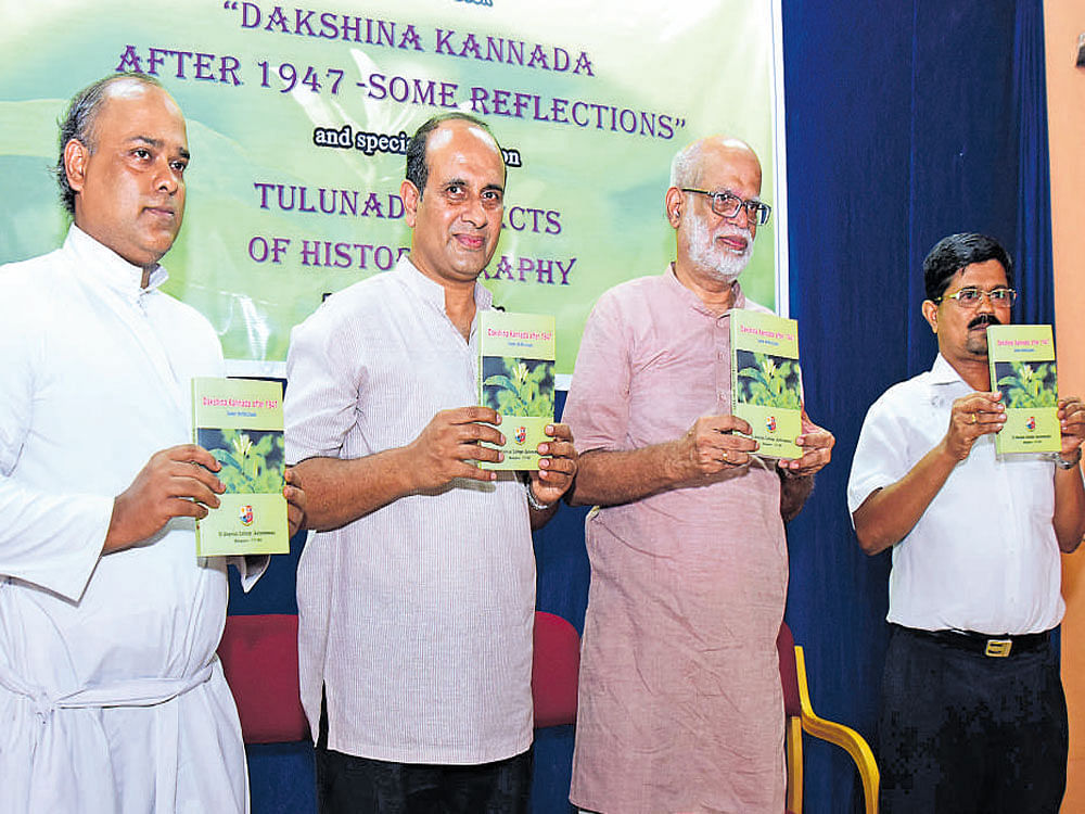 (Left to right) Principal (in-charge) St Aloysius College Melvin D'Cunha, rector Dionysius Vaz, historian Kesavan Veluthat and Vishal Pinto at the release of a book on Dakshina Kannada in&#8200;Mangaluru recently.
