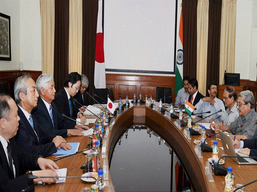 A joint statement issued after a meeting between Defence Minister Manohar Parrikar and his Japanese counterpart Gen Nakatani said: 'They reaffirmed the importance of respecting international law, as reflected notably in the United Nations Convention on the Laws of the Seas (Unclos), of the peaceful settlement of the disputes without any threat or use of force, and of ensuring freedom and safety of navigation and over-flight as well as unimpeded lawful commerce in international waters.' PTI