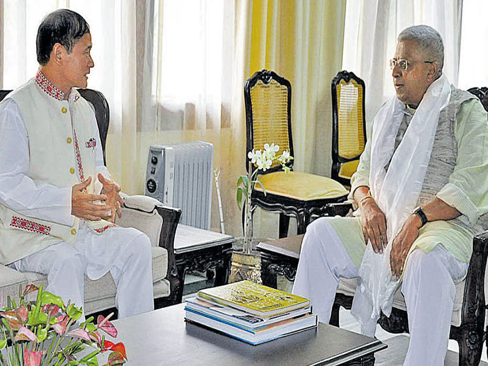 Arunachal Pradesh Chief Minister Nabam Tuki calls on Governor Tathagata Roy at Raj Bhavan in Itanagar on Friday. C SINHA