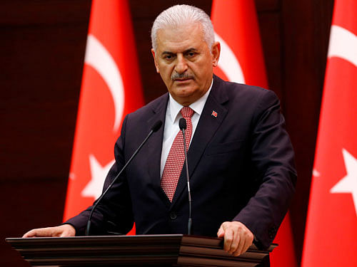 Turkish Prime Minister Binali Yildirim today denounced what he said was an illegal attempt' by elements in the military after bridges were partially shut down in Istanbul and jets flew low over Ankara. Reuters File photo