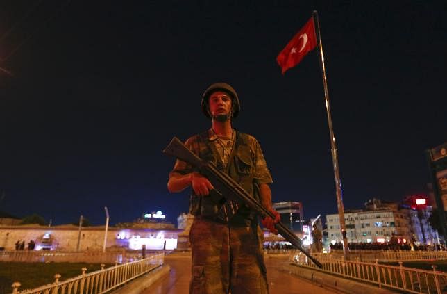 A Turkish military stands guard near the Taksim Square in Istanbul, Turkey. REUTERS/
