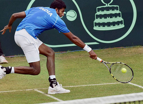 Rohan Bopanna plays against Korea's Hong Chung in the Asia/ Oceania Group I 2nd Round of Davis Cup in Chandigarh on Sunday. Bopanna won the match 3-6, 6-4, 6-4. PTI Photo