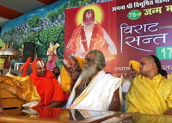 Nritya Gopal Das (C), a Hindu priest and chairman of Shri Ram Janam Bhoomi Nyas, a trust that is committed to building a Ram temple at a disputed religious site, attends his birthday celebration ceremony in Ayodhya in Uttar Pradesh. Reuters file photo