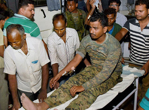 An injured CRPF jawan being taken to hospital after a naxal attack took place near the border of Gaya and Aurangabad district, in Gaya on Monday. PTI Photo