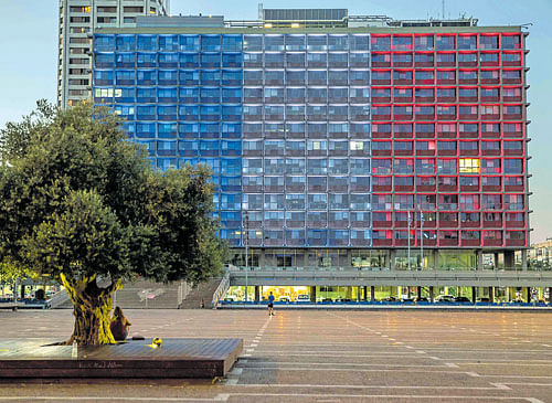 shared pain: The Tel Aviv city hall is lit up in the colours of the French flag to honour victims of the Nice attack. Nice was an even more direct and deadlier echo of a 2011 rampage in which an Arab-Israeli man's truck barrelled down a Tel Aviv street, killing one and wounding 17. nyt