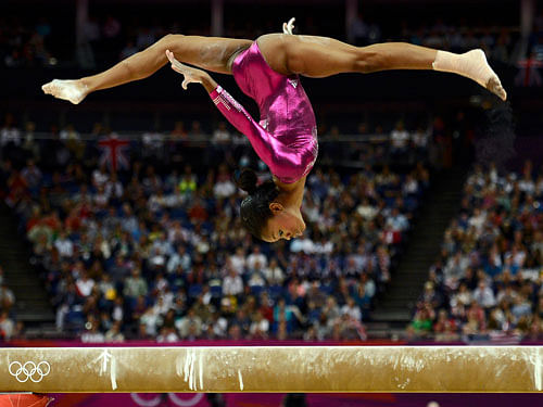 Gabrielle Douglas of the U.S. competes in the balance beam during the women's individual all-around gymnastics final in London. Reuters File Photo.