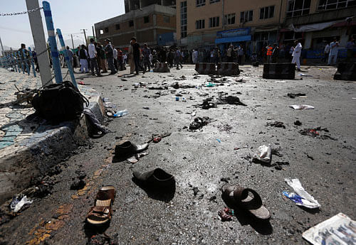 The shoes of victims are seen at the site of blast in Kabul, Afghanistan July 23, 2016.REUTERS