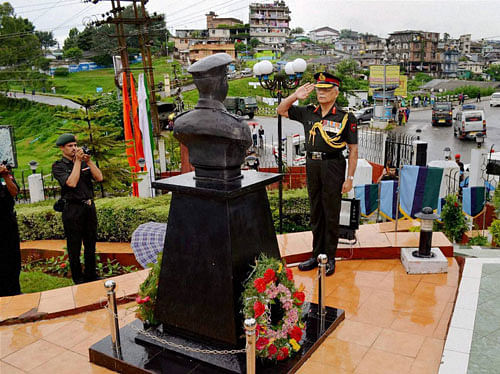 Lieutenant General SP Nawathe, VSM, General Officer Commanding 101 Area pays homage to martyrs of the 1999 Kargil war on the occasion of Kargil Vijay Diwas at the Rhino Heritage Museum in Shillong Cantt on Tuesday. PTI Photo/PIB