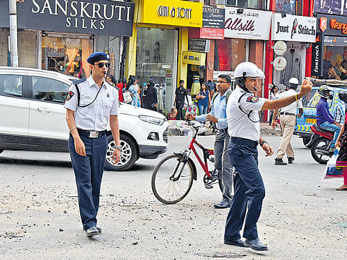 inspiring More and more youngsters are volunteering to become traffic wardens. DH PHOTO BY S K DINESH