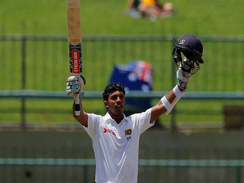 Sri Lanka's Kusal Mendis celebrates scoring his maiden century on day three of the first test cricket match between Sri Lanka and Australia in Pallekele, Sri Lanka, Thursday, July 28, 2016. AP/PTI