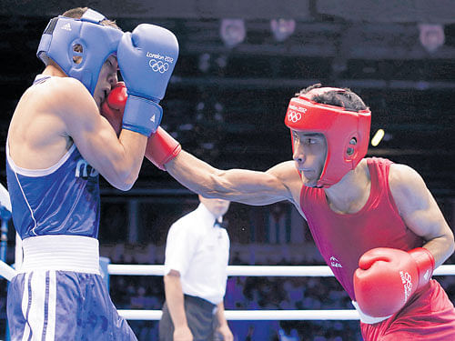 powerful A regular at the amateur level, India's Shiva Thapa (right) believes the past four years have helped him develop into a better boxer. Reuters file photo