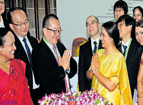 Health and Family Welfare Department Principal Secretary Shalini Rajneesh greets Singapore Consul General Roy Koh at the inauguration of Maternal and Child Health Services Enhancement Programme in Bengaluru on Monday. DH PHOTO