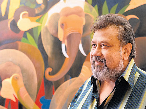 Senaka Senanayake with his painting.