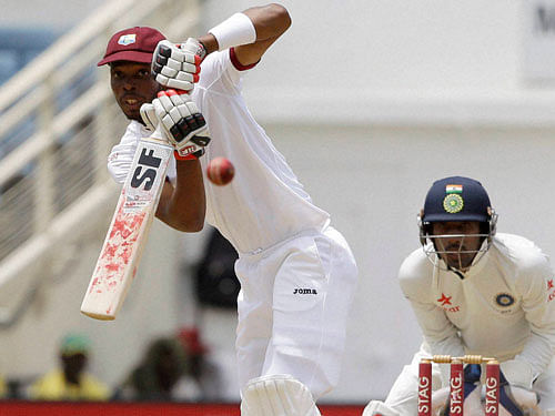 West Indies' Roston Chase plays a shot from the bowling of India's Amit Mishra during day five of their second cricket Test match at the Sabina Park Cricket Ground in Kingston, Jamaica, Wednesday, Aug. 3, 2016. AP/PTI(