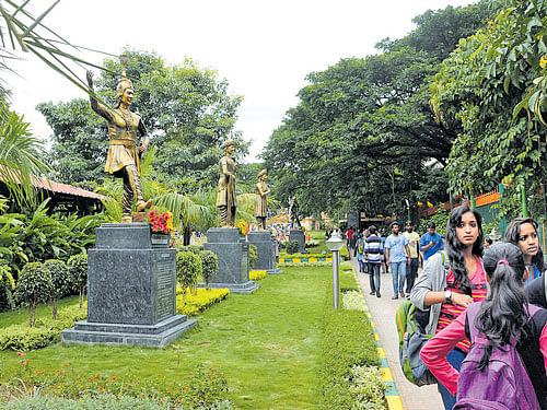 Visitors take a walk in the Ranadheera Kanteerava Park near South End Circle in  Jayanagar, which was inaugurated on Saturday. dh photo