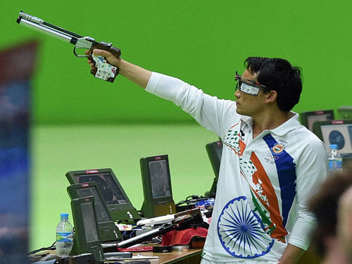 India's shooting player Jitu Rai plays qualifying round during the Rio Olympic 2016 at Rio de Janeiro, Brazil on Saturday. PTI Photo