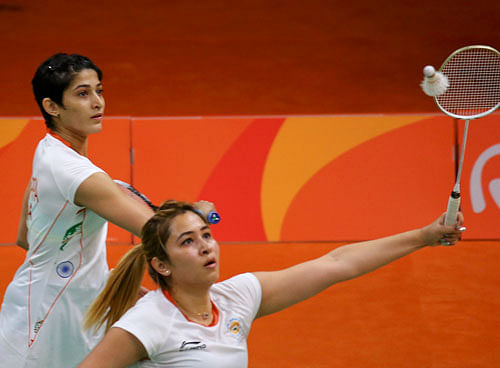 Jwala Gutta and Ashwini Ponnappa  play against Eefje Muskens and Selena Piek  of Netherlands. REUTERS