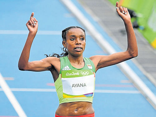 superb Ethiopia's Almaz Ayana wins the 10000M race with a record-breaking run. DH photo/ kn shanth kumar