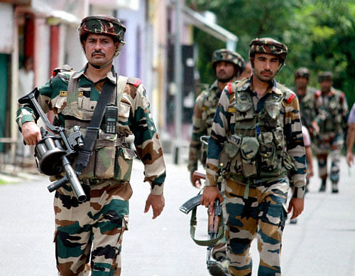 Security personnel carry out a search operation in Kunjwani area of Jammu after getting information about a 'suspicious movement' in Jammu on Friday. PTI Photo