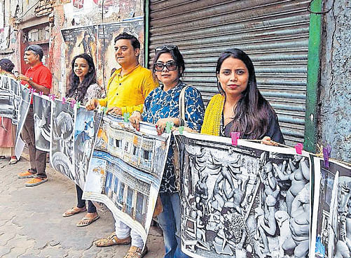 Kounteya Sinha and members of the 'Nobodies' participate in the Sainthood Project on the streets of Kolkata as a trial run before they display the same in Rome, during the canonisation of Mother Teresa on September 4.