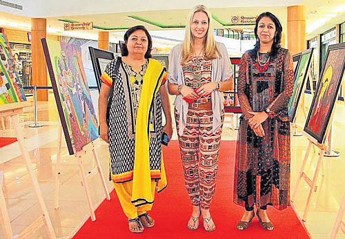 Lona Logan (centre) with friends and artists Anuradha Thakur (left) and Rangoli Garg (right) at their art exhibition in Inorbit Mall, Hyderabad.