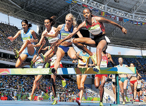 setting the pace India's Lalita Babar (left) during the 3000M steeplechase heats at the Olympic Stadium on Saturday. AFP