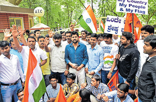 Prathap Simha, president,  State BJP Yuva Morcha and activists of Akhil Bharatiya Vidyarthi Parishad (ABVP) protest outside United Theological College in Bengaluru on Sunday, condemning 'anti-India' slogans raised at the event on human rights abuses in Kashmir. DH&#8200;PHOTO