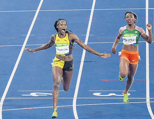 champion of super saturday: Jamaica's Elaine Thompson powers to victory in the women's 100M. dh photo. kn shanth kumar