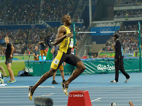 Usain Bolt (JAM) of Jamaica reacts. REUTERS
